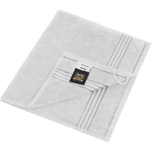 A grey guest towel with a textured border and a hanging loop, featuring a branded label.