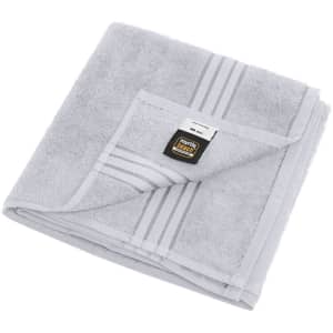 A grey hand towel with striped detailing, featuring a logo in the corner.