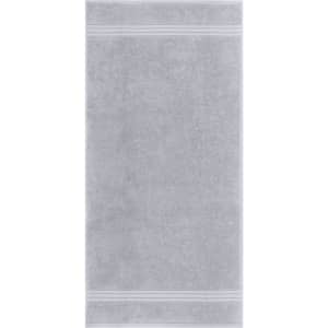 A grey hand towel with a textured surface and two horizontal stripes. It features a logo at the corner.