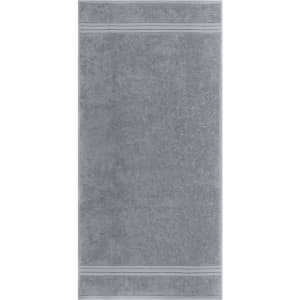 A grey hand towel featuring subtle striped details and a soft texture. The product includes branding.