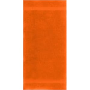 An orange hand towel featuring a textured surface and two decorative stripes. It has a logo positioned on it.
