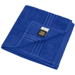 A blue hand towel folded neatly, featuring a pocket and a logo. Soft texture and a striped design are visible.