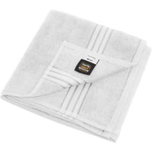 A grey hand towel featuring white stripes and a logo, neatly folded.