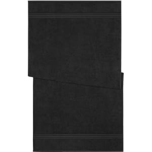 A black bath towel featuring a textured design and subtle stripes, with a logo in one corner.