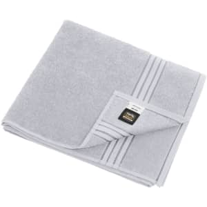 A grey bath towel with a folded edge and a small logo tag. It features subtle striped detailing.