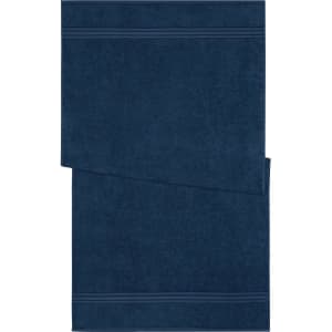 A navy blue bath towel with a textured finish and two horizontal stripes. It features a logo or branding.