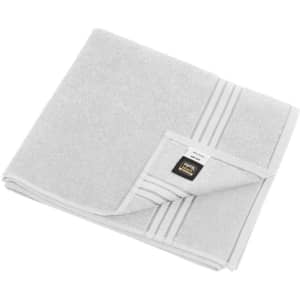 A folded bath towel in light grey with a striped design and a logo tag.