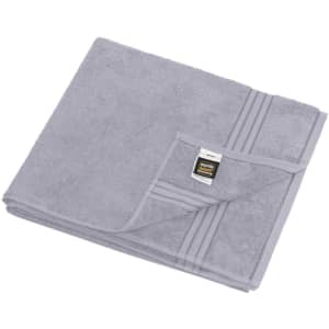 A grey sauna sheet folded neatly, featuring a textured surface and a small logo on the corner.