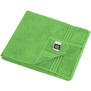 A green sauna sheet folded neatly, featuring a simple striped design and a label at one corner.