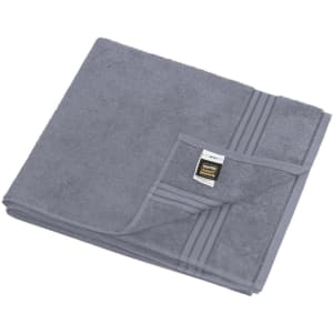 A grey sauna sheet folded neatly, featuring a tag and a textured surface. It has a subtle striped design.