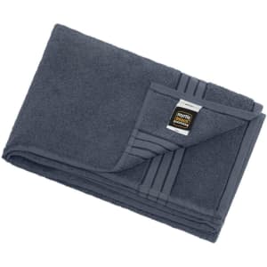 A dark grey bath sheet with a folded corner, featuring a logo tag. Soft and fluffy texture.