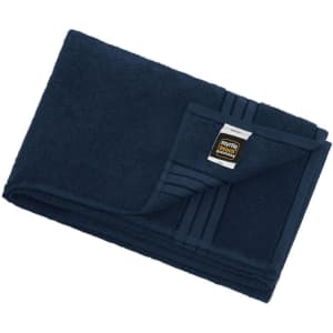A navy bath sheet featuring a textured design and a label. It's soft and plush in texture.