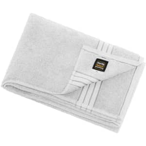 A folded grey bath sheet with a striped design and a logo on the corner.