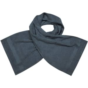 A grey sport towel with a soft texture, featuring a simple design and decorative stitching.