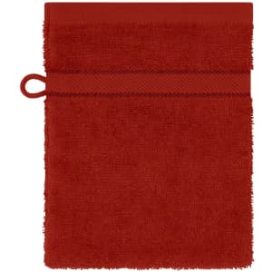 A red flannel towel with a textured surface and a loop for hanging. Features a simple, solid design.