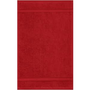 A red guest towel with a textured design, featuring two horizontal stripes. It has a logo in one corner.