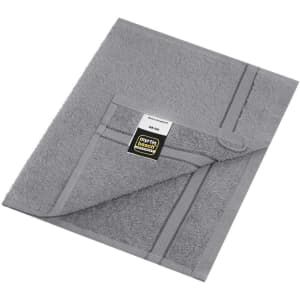 A grey guest towel with a soft texture, featuring a folded corner and a branding label.