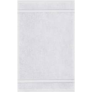 A white hand towel featuring a textured design and a logo at the corner.