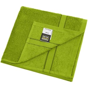 A green hand towel with a folded corner and a logo tag. Soft texture with a vibrant colour.