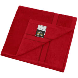 A red hand towel with a textured surface and a pocket on one side. The towel has a branding label.