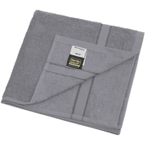 A grey hand towel featuring a textured design and a logo at the corner.