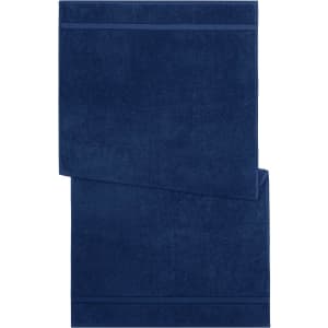 A navy blue bath towel featuring a textured stripe design and a branded logo.