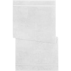 Two white bath towels stacked with a subtle textured pattern and a logo in the corner.