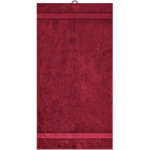 A red hand towel featuring a textured surface and two decorative stripes. It has a loop for easy hanging.
