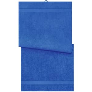 A blue bath towel featuring a textured design and two horizontal stripes. It includes a logo or branding.