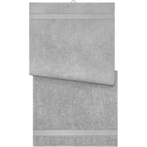A grey bath towel displayed flat, featuring a subtle texture and a hanging loop.