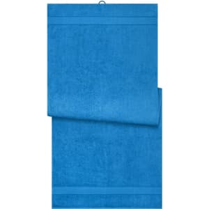 A blue sauna sheet displayed flat, featuring a soft, textured surface and a hanging loop. It has a logo on it.