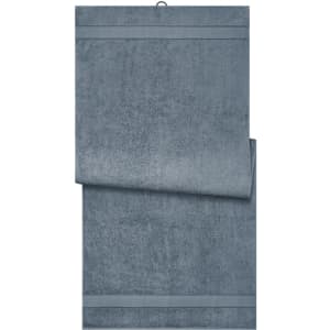 A soft, dark grey towel with a textured finish and a logo at the top. Ideal for bath and sauna use.