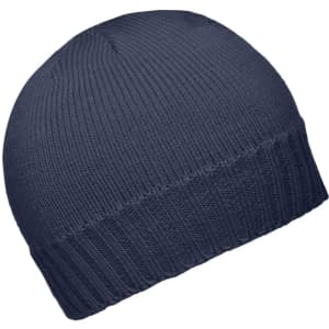 A navy ribbed beanie with a folded brim, featuring a logo on one side.