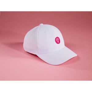 A white Flexfit® cap featuring a vibrant pink logo, set against a pink background.