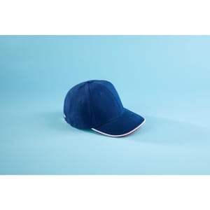 A navy blue 6 panel double sandwich cap with a contrasting brim and a logo on the side.