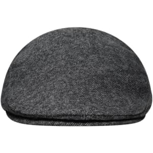 A grey herringbone cap with a rounded top and a small brim, featuring a logo on the side.