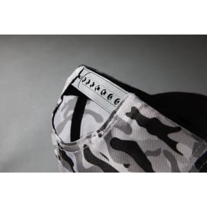 A grey camouflage cap with an adjustable strap at the back, featuring a logo.