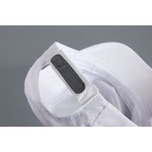 A white 3 panel cap featuring a strap adjustment and inner lining, with a branding logo visible.