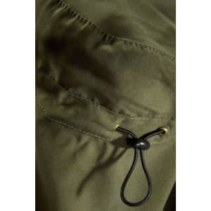 An olive green fabric with a drawstring feature, showcasing a close-up of the material's texture and stitching.