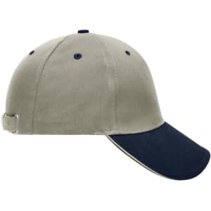 A beige and navy 5 panel sandwich cap featuring a contrasting peak and an adjustable strap at the back.