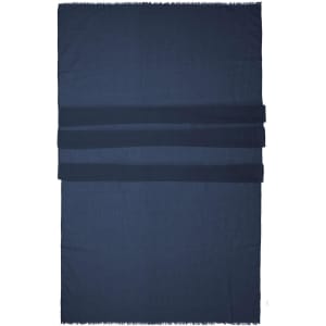 A navy scarf featuring three horizontal straps and a fringed edge, with a branding logo.