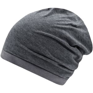 A grey slouchy beanie with a soft fabric and a ribbed band at the bottom. It features a logo.