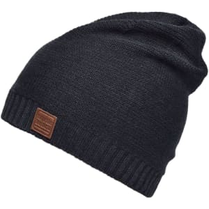 A cotton hat in black with a folded brim and a small logo patch.