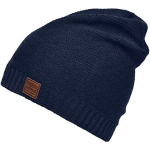 A navy cotton hat with a textured design and a ribbed brim, featuring a logo on the side.