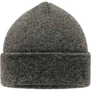 A grey knitted beanie with a folded cuff and a textured finish. It features a logo on one side.