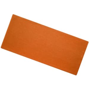 An orange yoga mat on a white background. The mat is rectangular and textured, with no logos visible.