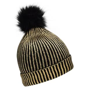 Metallic black and gold beanie with a fluffy black pom-pom on top and a striped design. Features a logo.