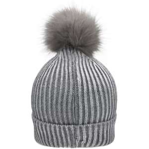 A grey metallic beanie with a fluffy pom-pom on top and ribbed texture. It features a logo on the side.