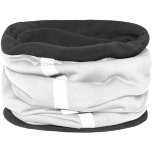 A soft scarf in grey and black, featuring a folded design with a subtle logo. Ideal as a winter accessory.