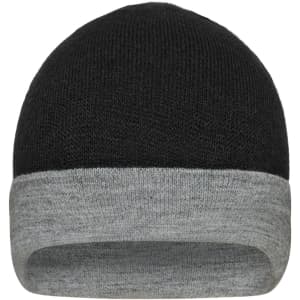 A reversible beanie featuring a black exterior and a grey cuff. It also includes a logo on the side.